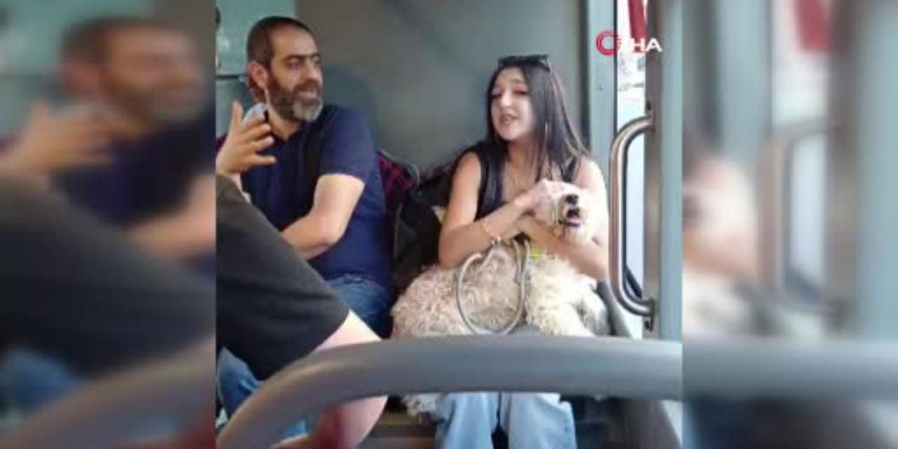 Köpekle otobüse binen kadın ve yolcular arasında arbede yaşandı